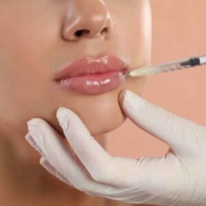 how to massage lip filler lumps